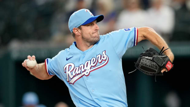 Aug 20, 2023; Arlington, Texas, USA; Texas Rangers starting pitcher Max Scherzer (31) delivers a pitch to the Milwaukee Brewers during the first inning at Globe Life Field. Mandatory Credit: Jim Cowsert-USA TODAY Sports  